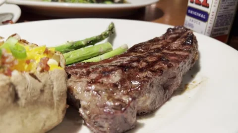 Steak and Back Potatoes Stock-Footage 296352686