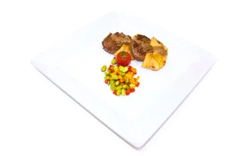 Steak and pineapple plate Foto stock
