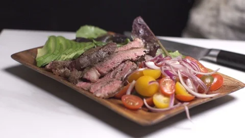 Steak and salad with lime squeeze Stock Footage 127119331