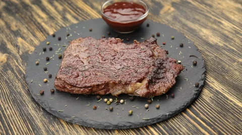 Steak and sauce rotate Stock Footage 65113553