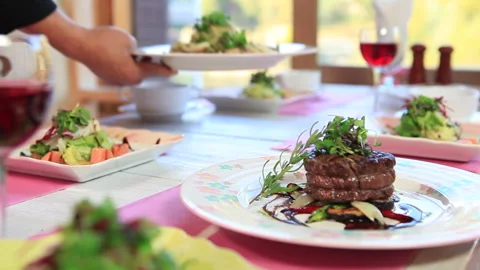 Steak and spaghetti on the kitchen table Vídeos de archivo 144430617