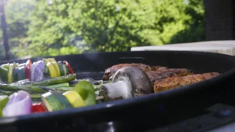 Steak and vegetable on the grill slow motion Video stock 223376537
