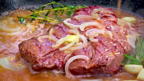 Steak and vegetables with aromatic herb infusion Stock Footage 324787428