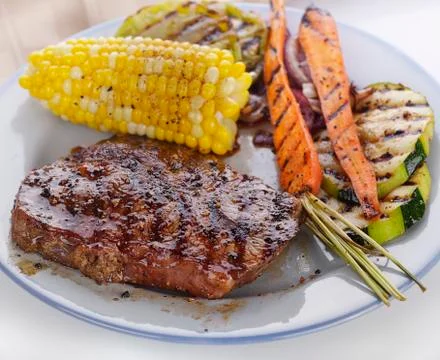 Steak and Vegetables Stock Photos