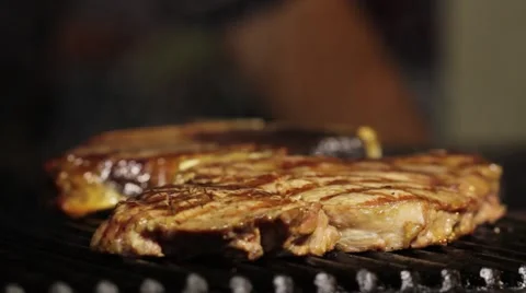 Steak on Barbecue grill Stock Footage 55843973