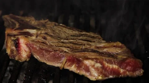 Steak on Barbecue grill Stock Footage 55843976