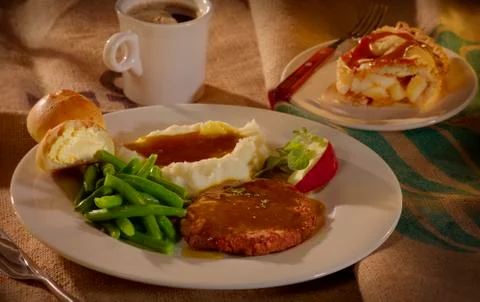 Steak with Beans and mashed Potatoes Stock Photos