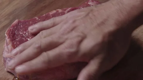 Steak being oiled 2 Stock Footage 194716427