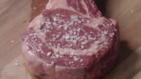 Steak being salted Stock Footage 194748083