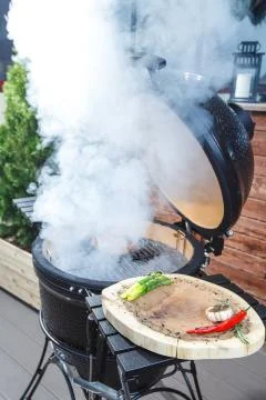 Steak is cooked on the grill Stock Photos