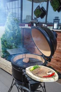 Steak is cooked on the grill Stock Photos