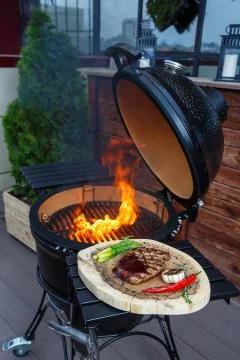 Steak is cooked on the grill Stock Photos