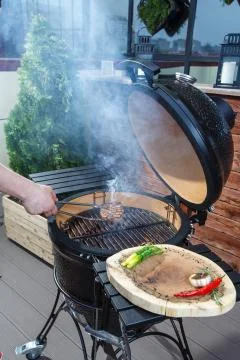 Steak is cooked on the grill Stock Photos