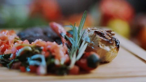 Steak cooked medium well cut sliced knife on a cutting board roast fillet Stock Footage 100304865