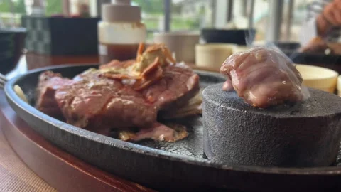 Steak Cooking on Hot Stone. Stock Footage 267168407