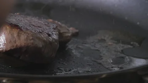 Steak Cooking in Pan Stock Footage 169612353