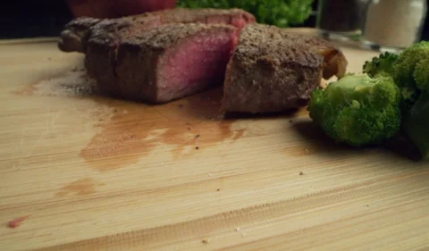 Steak Is Cut on Cutting Board Macro 4K Stock-Footage 120357956