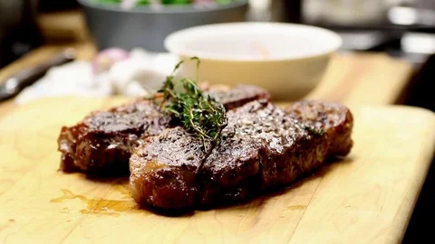 Steak On Cutting Board Stock Footage 79044682