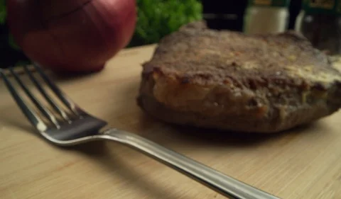 Steak on Cutting Board Macro 4K Stock-Footage 120357590
