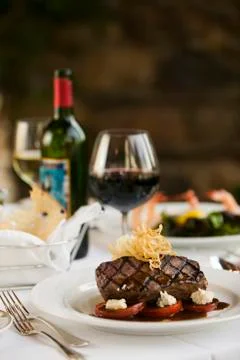 Steak dinner on white plate. Stock Photos