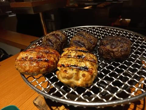 Steak on drying grill rack Stock-Fotos