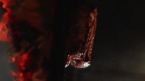 Steak on fire. Slow motion. 120 fps. Vertical video Stock Footage 172440016