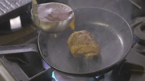 Steak Flambe beef meat Stock Footage 115069705