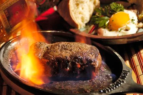 Steak flambe Stock Photos