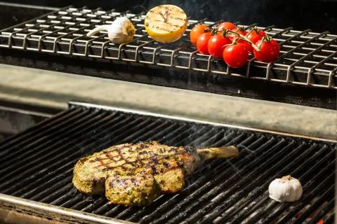Steak flame broiled on a barbecue Stock-Fotos