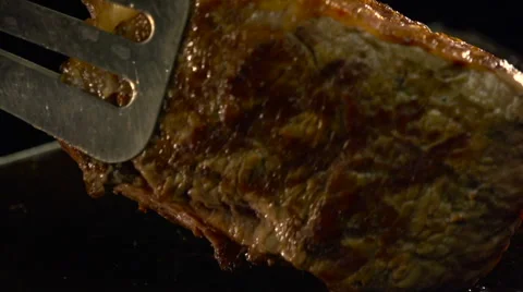 Steak flips Stock Footage 68030857