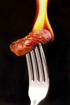 Steak on a Fork. Stock Photos