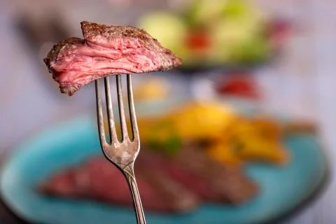 Steak on a fork Stock Photos