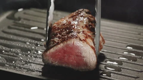 Steak fried on a grill Stock Footage 54111702