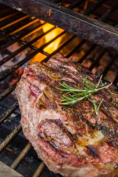 Steak fried on the grill Stock Photos