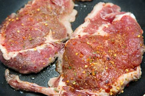 Steak frying. Stock Photos