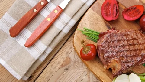 Steak garnished with green staff Video stock 88922688