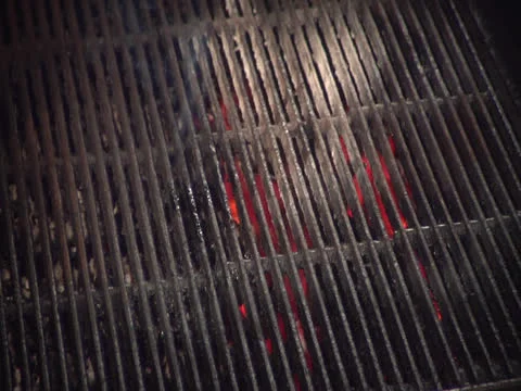 Steak getting laid on hot grill, static Video stock 26191337