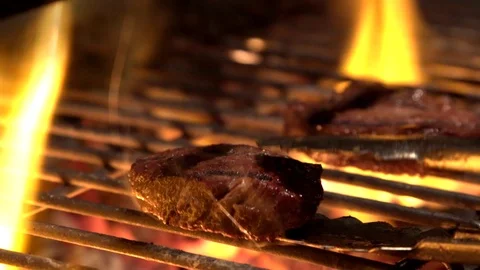 Steak grill action flipping flame Stock Footage 113275946