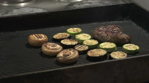 Steak on grill with flames Stock Footage 66039299