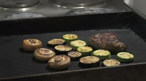 Steak on grill with flames Stock Footage 66039853