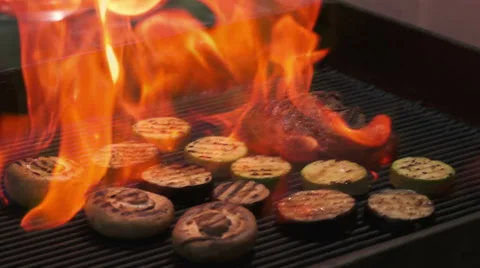 Steak on grill with flames Video stock 66040094