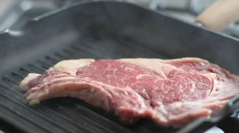 Steak on grill Stock Footage