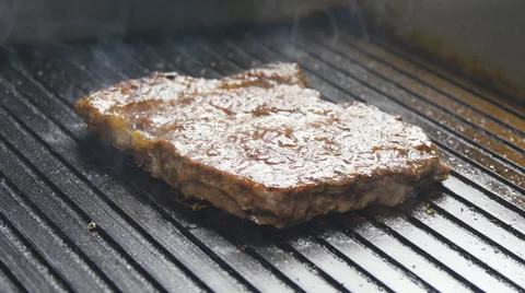 Steak on the grill Stock Footage 65135425