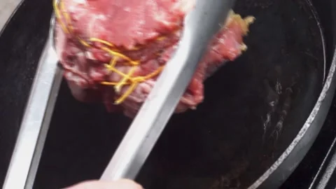 STEAK IN GRILL Video stock 135663976