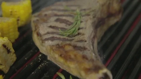 Steak grilled with corn Stock Footage 82771319