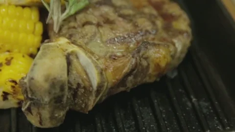 Steak grilled with corn Video stock 83293588