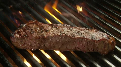 Steak grilling 144 Stock Footage