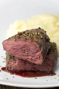 Steak halves Stock Photos