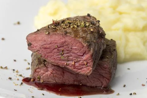 Steak halves Stock Photos