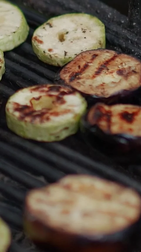 Steak meat is fried on fire and smoke. Barbecue grill with smoke on coals Stock Footage 322790903